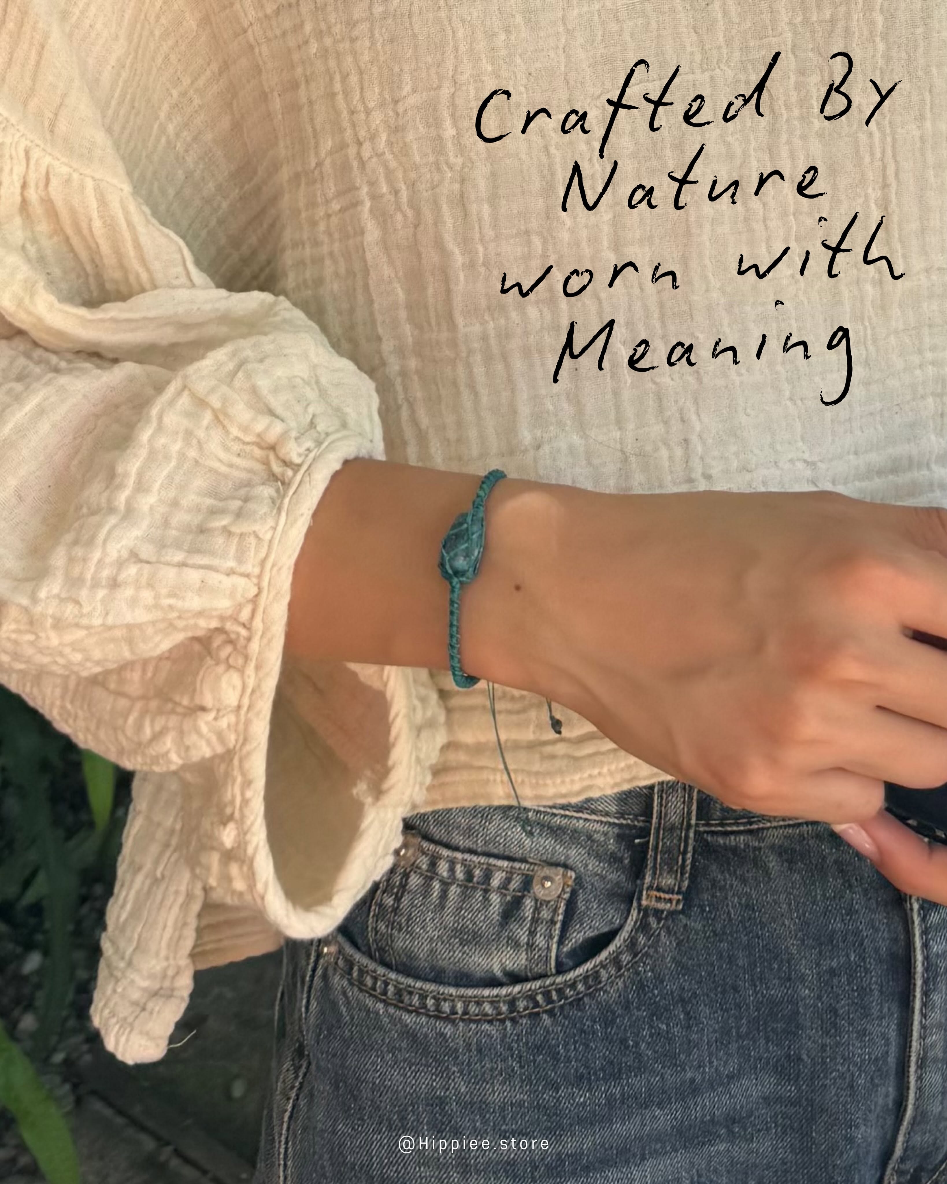 Teal cord stone bracelet worn on a wrist