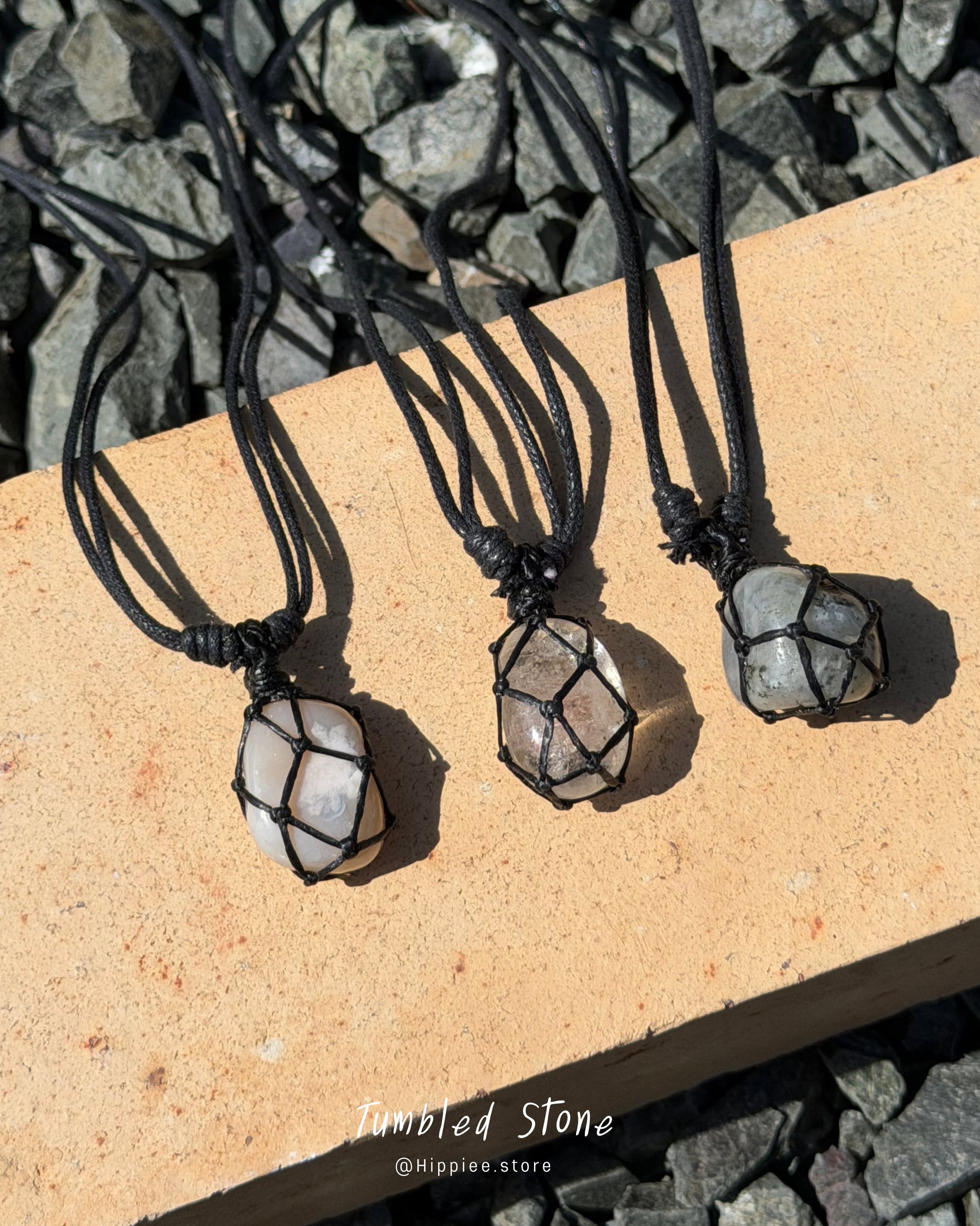 Clear quartz necklaces on black waxed cord